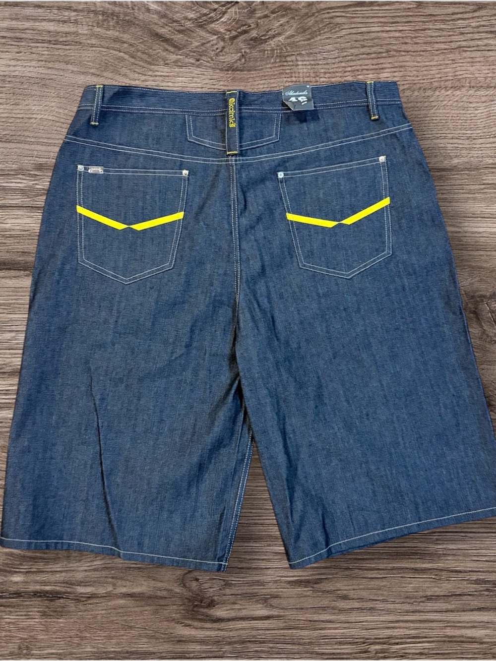 Akademiks Dark Blue Denim Shorts with Yellow Pocket Detail